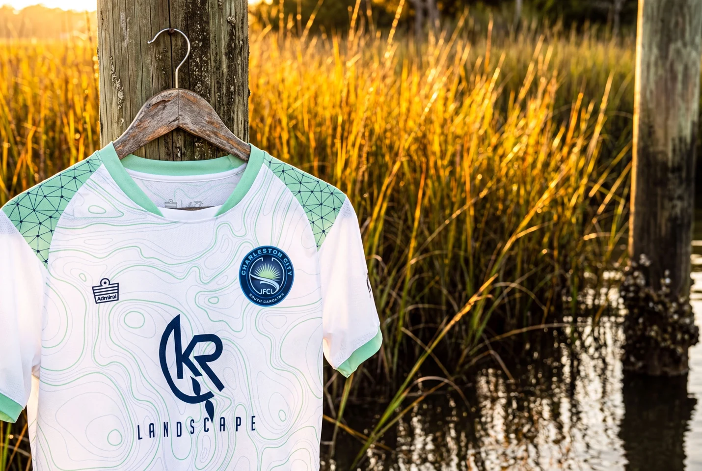 Boys white and teal home kit
